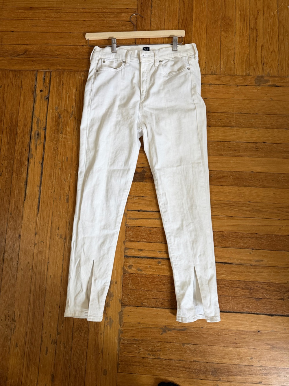 Gap high-rise skinny jeans featuring side slits at the hem.